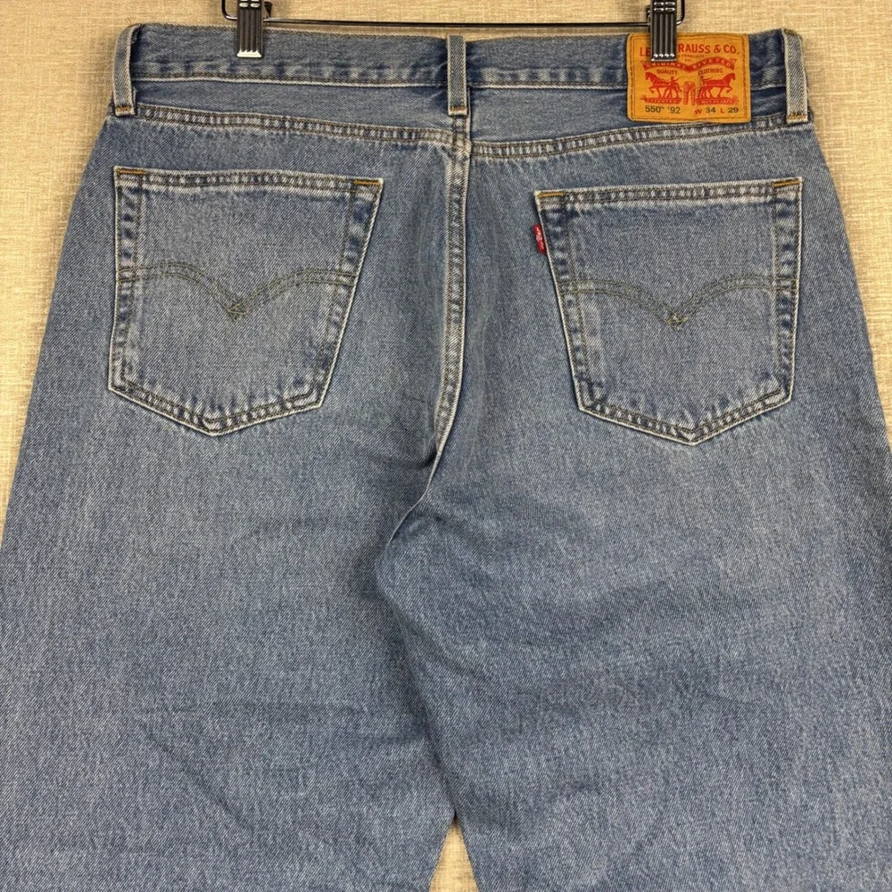 Levis 550 92 Relaxed Tapered Mens 34x29 Jeans Light Washed Blue Workwear Denim